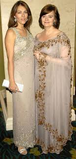... figure-flattering sequinned sari ...